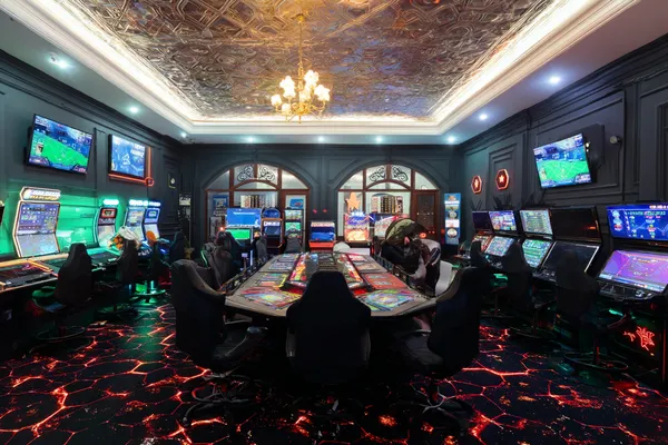 AVIATOR FREE BET Casino — Step inside our high-end casino experience A glamorous woman holding casino chips in a neon-lit environment, representing the premium online casino atmosphere of AVIATOR FREE BET.