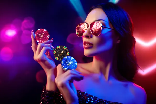 A player using their smartphone during a festive local event, representing AVIATOR FREE BET’s fully mobile-friendly casino.